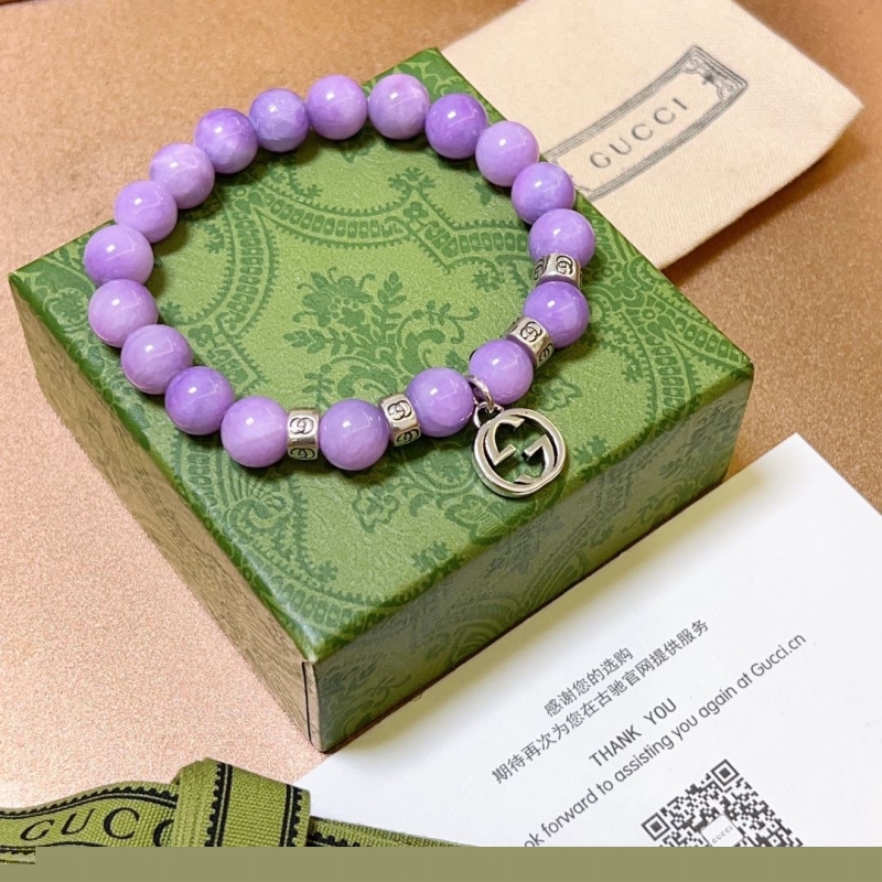 G*u*i bracelets